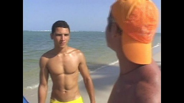 Hot gay threesome fucking on the beach