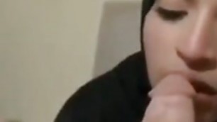 Shy Arab hijabi girl licking some white cock